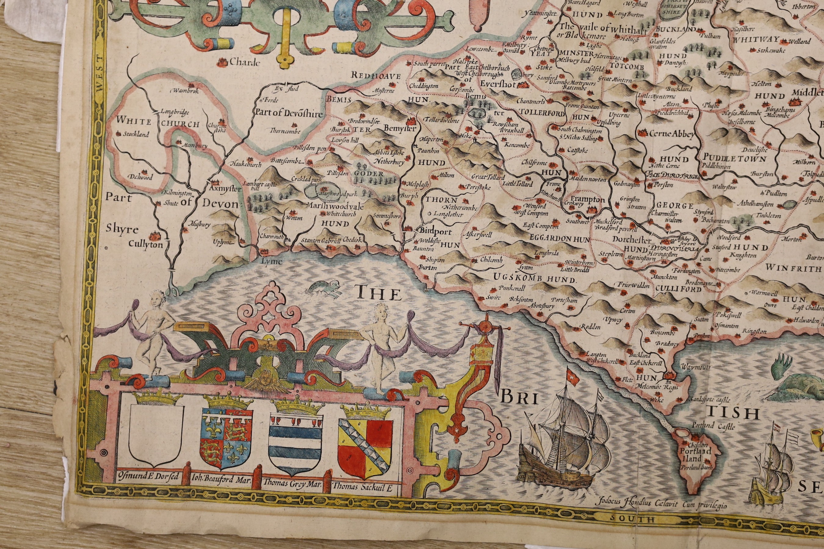 John Speed, (1552-1629) Dorsetshyre, hand coloured map, with the Shire-towne Dorchester described, 40.5cm X 53cm